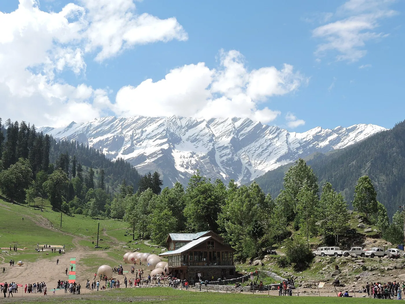 Snow-covered peaks above a Himalayan valley